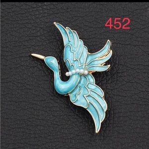 452. Betsey Johnson Blue Enamel Pearl Crane brooches